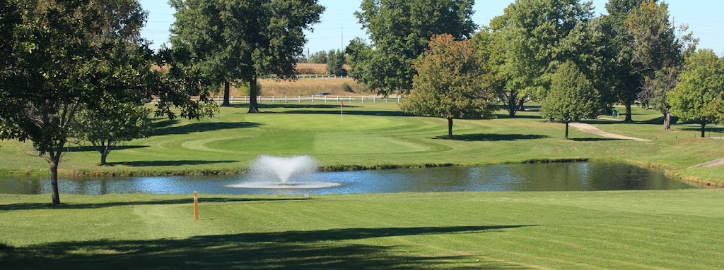 Panoramic view of a lush green golf course at Shamrock Hills Golf Club. Smooth