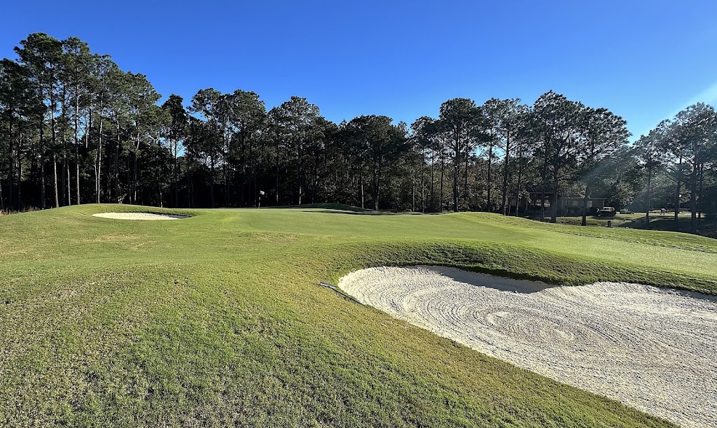 Panoramic view of a lush green golf course at Shell Landing Golf Club. Smooth