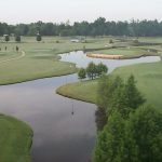 Panoramic view of a lush green golf course at Shiloh Ridge Golf & Fitness. Smooth