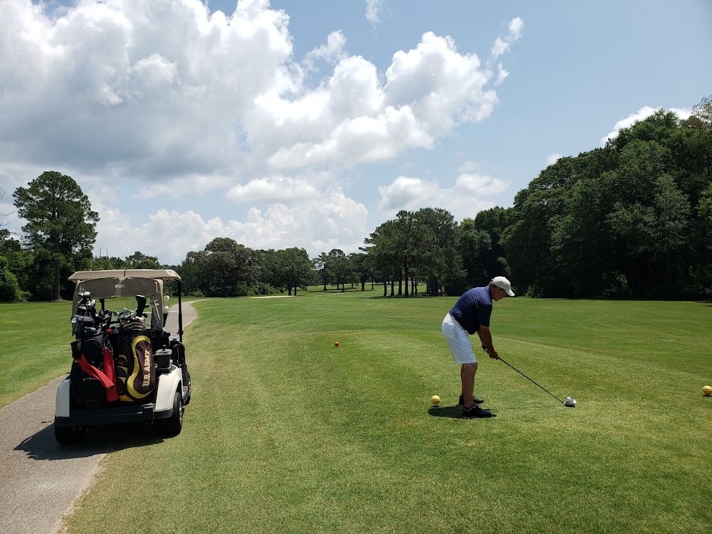 Panoramic view of a lush green golf course at Silver Wings Golf Club. Smooth