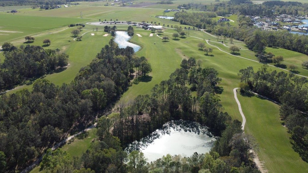 Panoramic view of a lush green golf course at Soldiers Creek Golf Course. Smooth