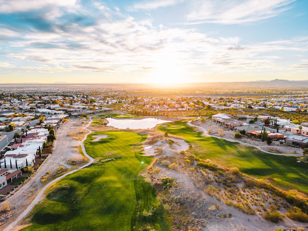 Panoramic view of a lush green golf course at Sonoma Ranch Golf Course. Smooth