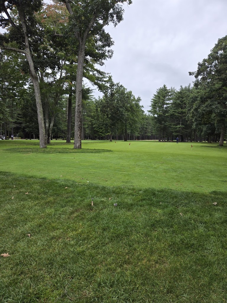 Panoramic view of a lush green golf course at Souhegan Woods Golf Club. Smooth