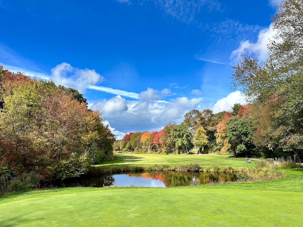 Panoramic view of a lush green golf course at South Shore Country Club. Smooth