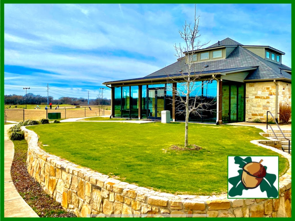 Panoramic view of a lush green golf course at Southern Oaks Golf & Tennis Club. Smooth