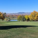 Panoramic view of a lush green golf course at Southridge Golf Course. Smooth