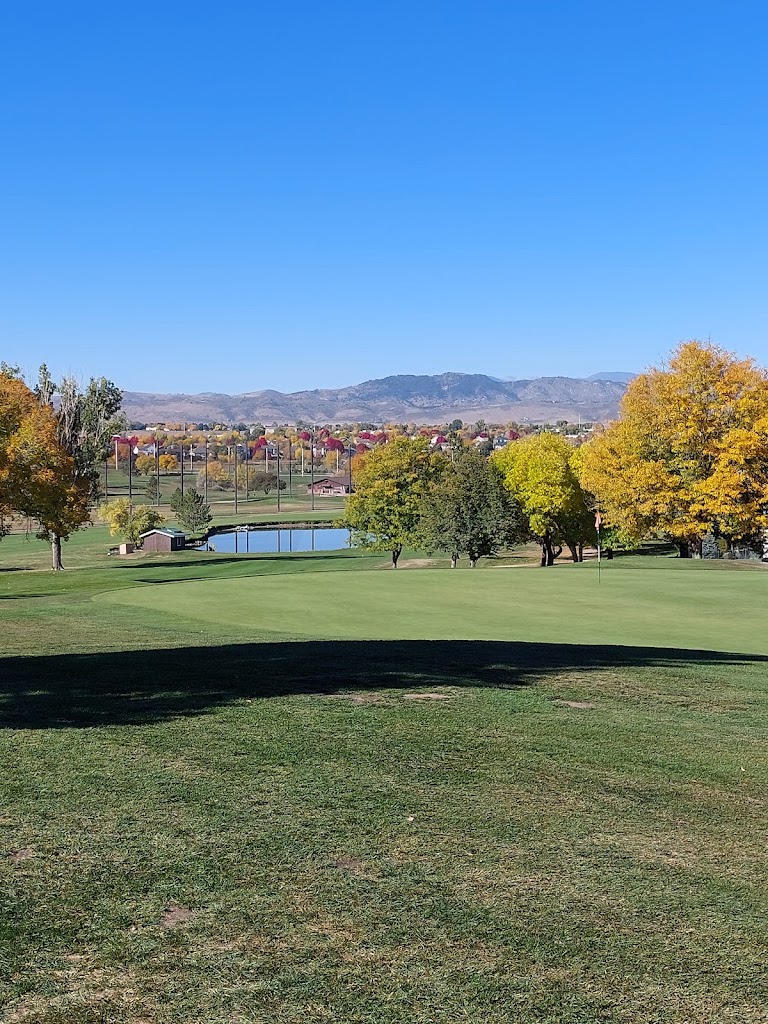 Panoramic view of a lush green golf course at Southridge Golf Course. Smooth