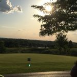 Panoramic view of a lush green golf course at Southwind Golf Course. Smooth