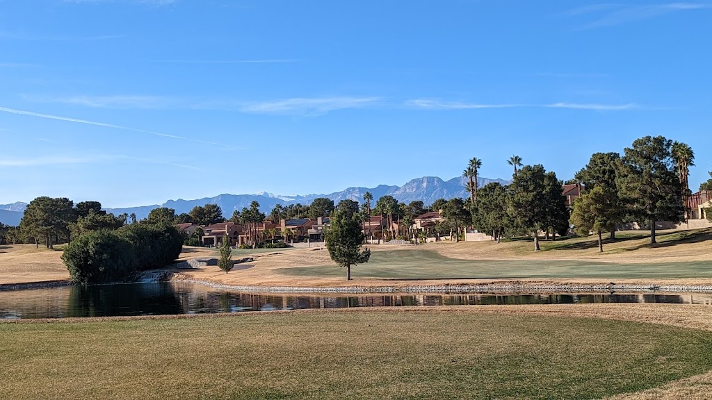 Panoramic view of a lush green golf course at Spanish Trail Private Country Club. Smooth