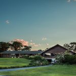 Panoramic view of a lush green golf course at Spring Lake Golf Club. Smooth