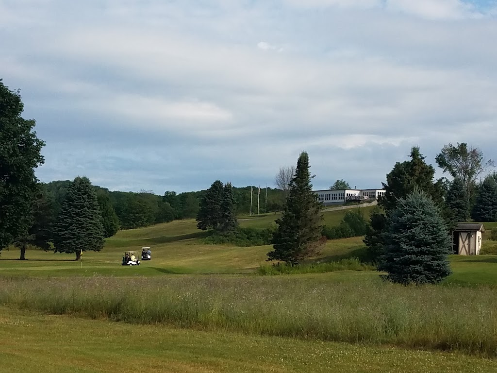 Panoramic view of a lush green golf course at Springbrook Golf Club. Smooth