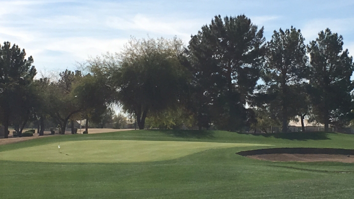 Panoramic view of a lush green golf course at Springfield Golf Resort. Smooth