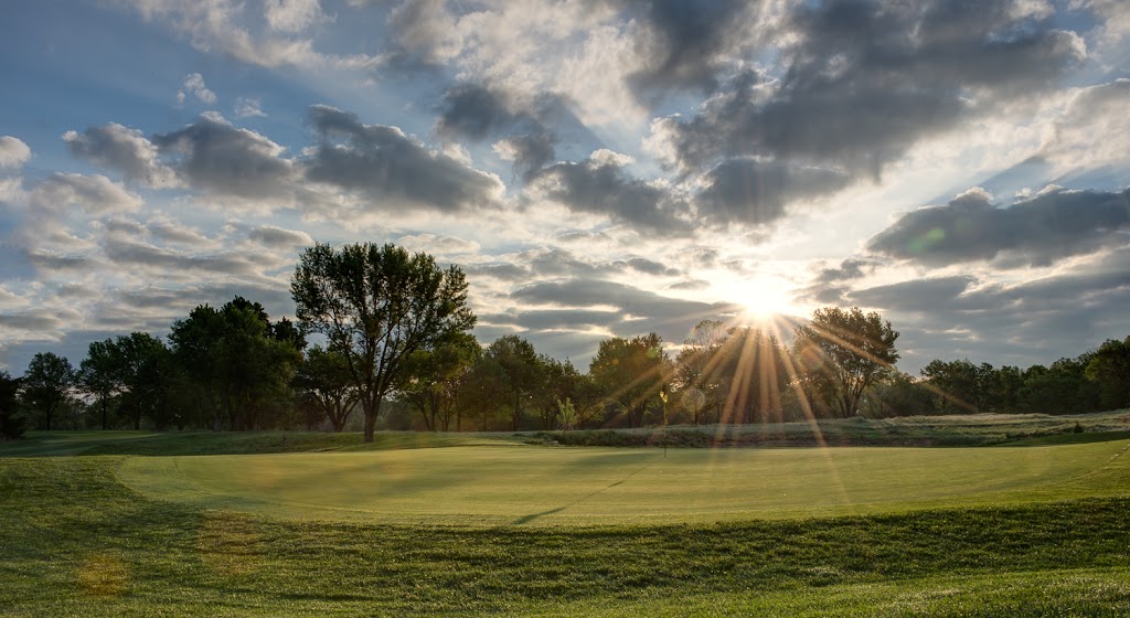 Panoramic view of a lush green golf course at St Andrews Golf Club. Smooth