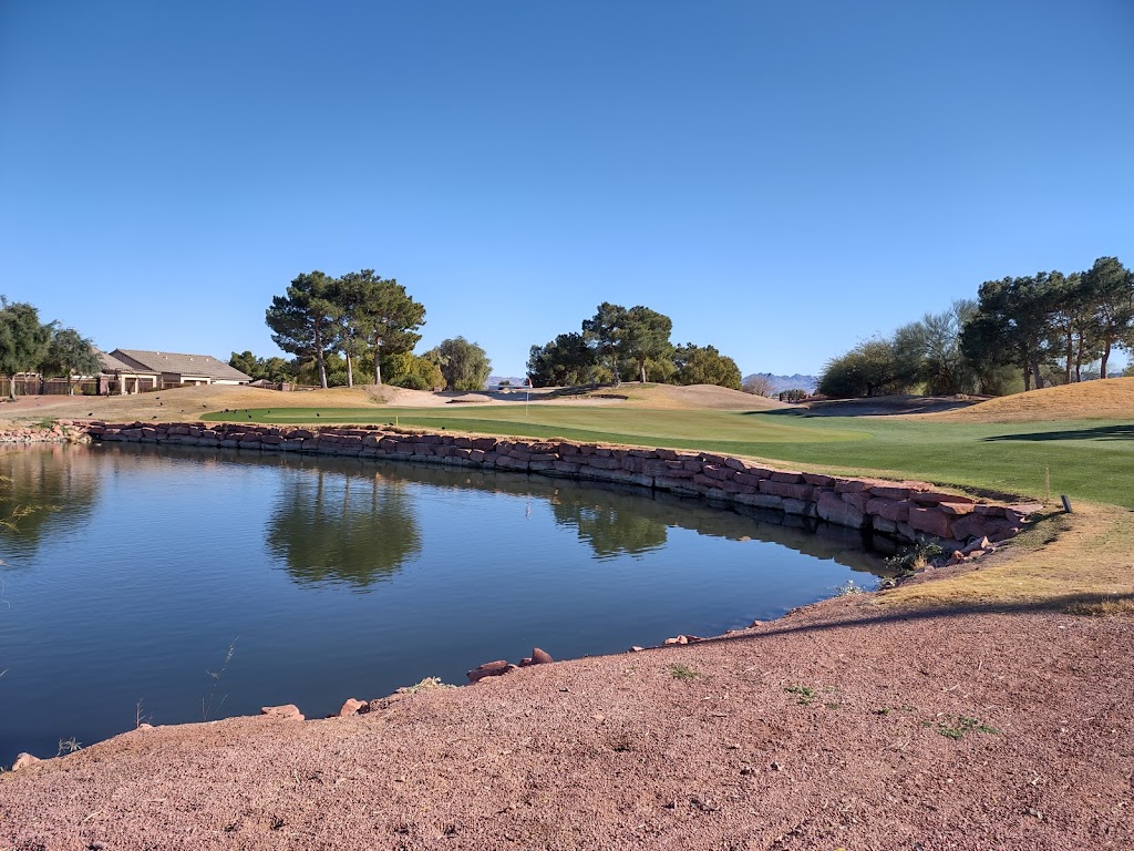 Panoramic view of a lush green golf course at Stallion Mountain Golf Club. Smooth