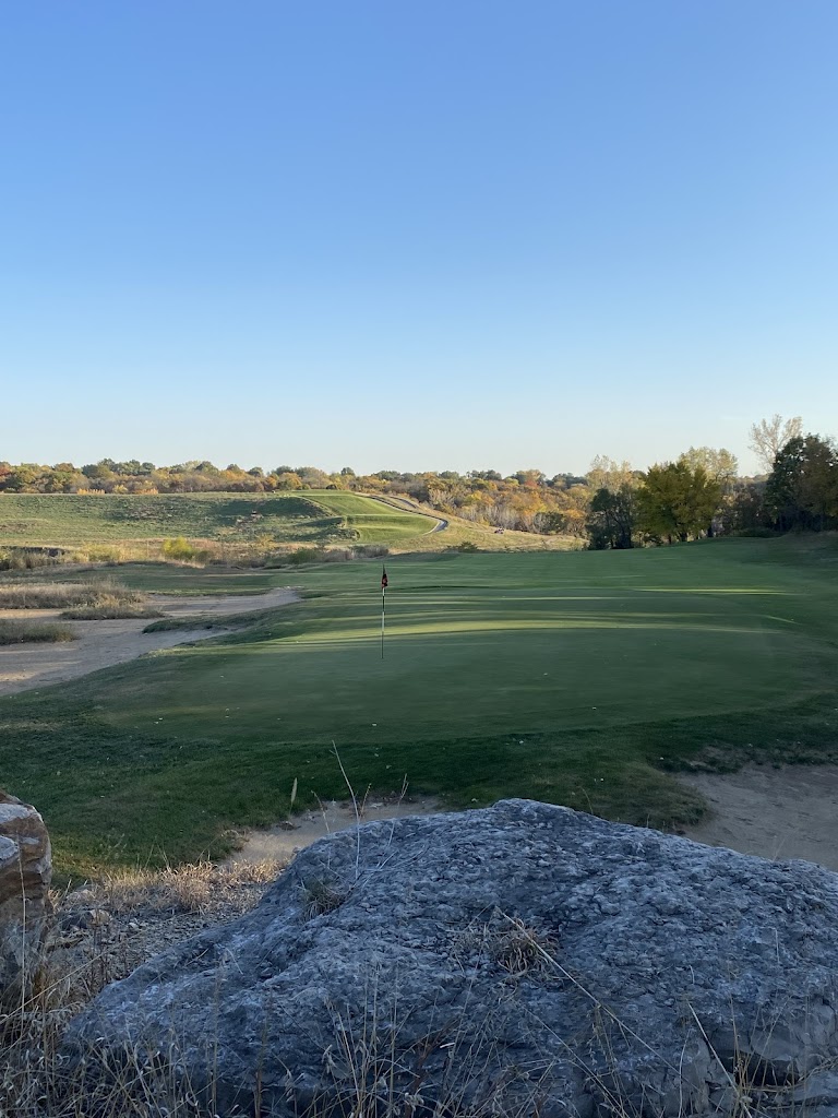 Panoramic view of a lush green golf course at Stone Canyon Golf Club. Smooth