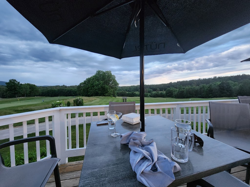 Panoramic view of a lush green golf course at Stonebridge Country Club. Smooth