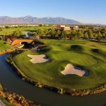 Panoramic view of a lush green golf course at Stonebridge Golf Club. Smooth