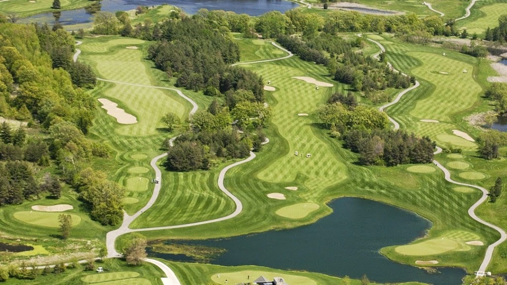 Panoramic view of a lush green golf course at Stonewall Orchard Golf Club. Smooth