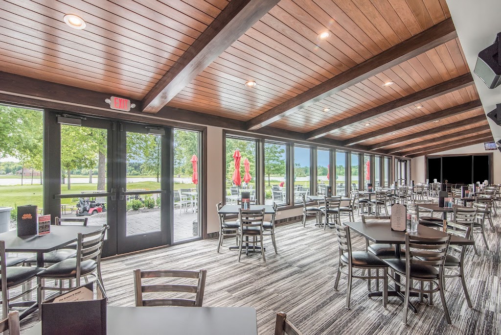 Panoramic view of a lush green golf course at Sugarbush Golf Club & Banquet Center. Smooth