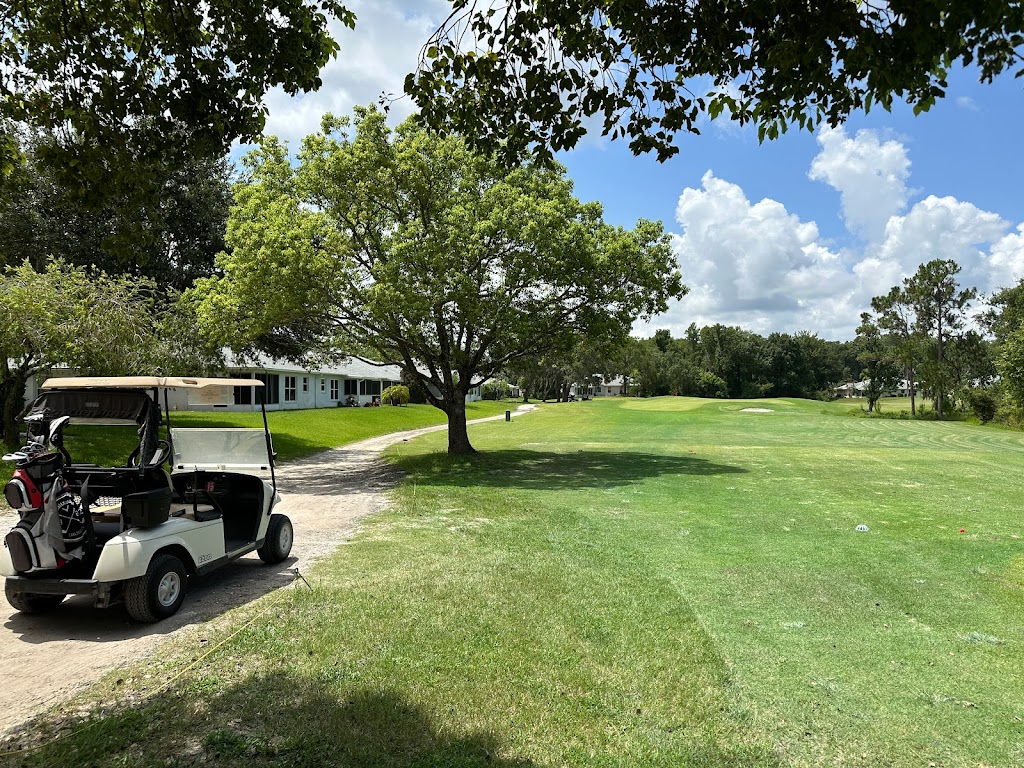 Panoramic view of a lush green golf course at Summertree Golf Club. Smooth