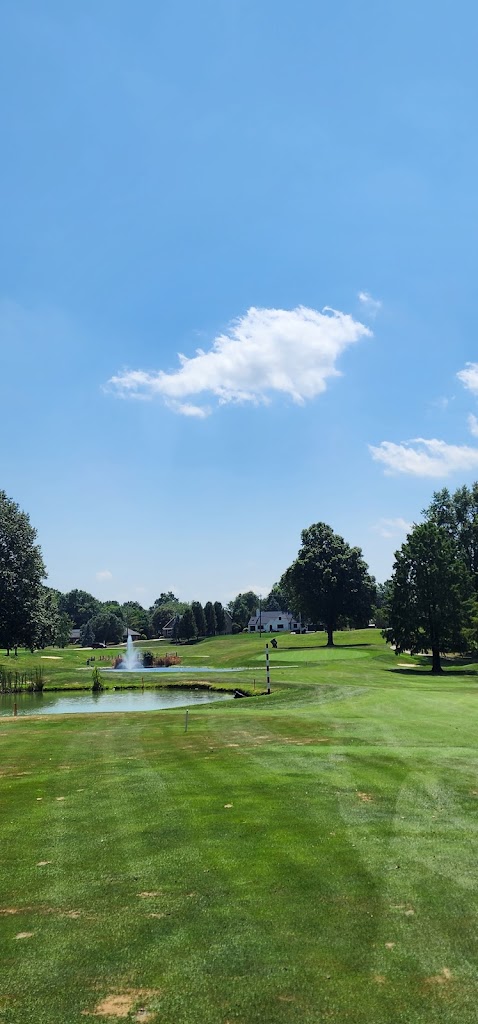 Panoramic view of a lush green golf course at Summit Hills Country Club Inc. Smooth