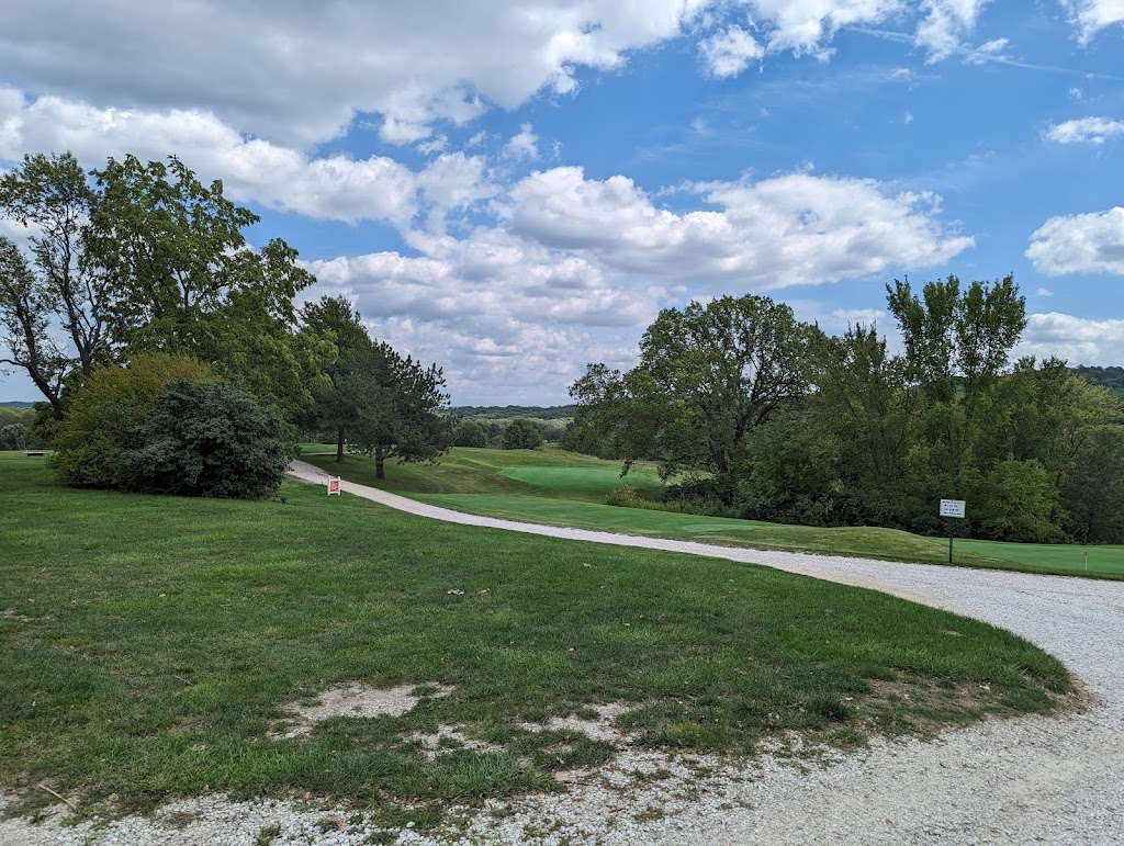 Panoramic view of a lush green golf course at Sun Valley Golf Course. Smooth