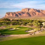 Panoramic view of a lush green golf course at Superstition Mountain Golf & Country Club. Smooth