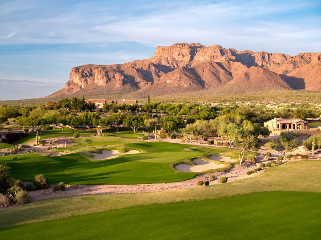 Panoramic view of a lush green golf course at Superstition Mountain Golf & Country Club. Smooth