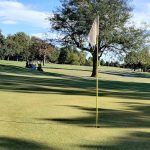 Panoramic view of a lush green golf course at Surrey Hills Golf Club. Smooth