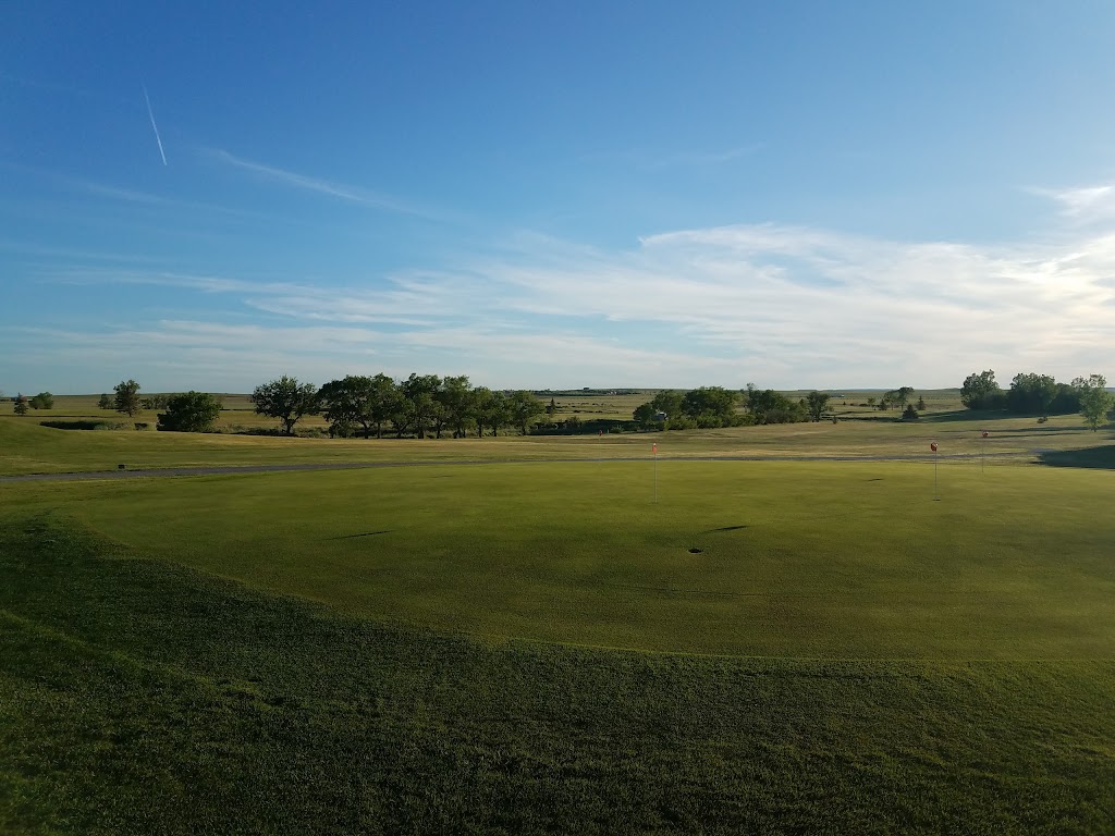 Panoramic view of a lush green golf course at Sweetwater Golf Course. Smooth