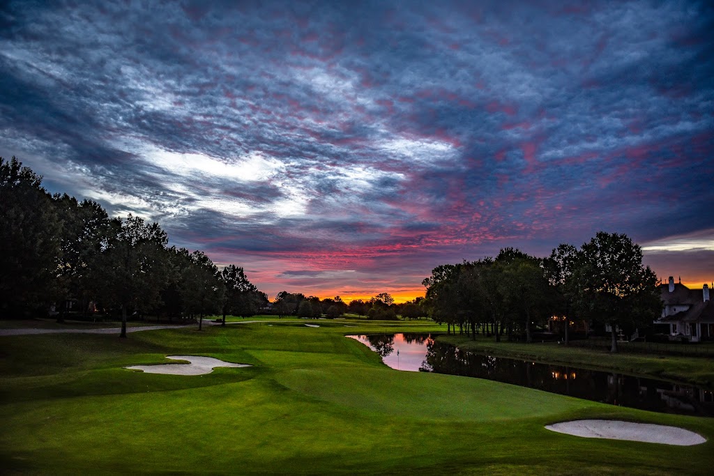 Panoramic view of a lush green golf course at TPC Southwind. Smooth