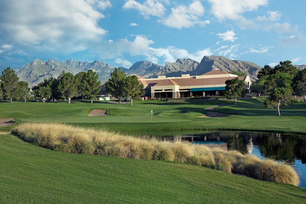 Panoramic view of a lush green golf course at TPC Summerlin. Smooth