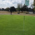 Panoramic view of a lush green golf course at Tahlequah city course/RIVERLINKS GC. Smooth