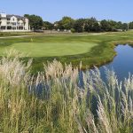 Panoramic view of a lush green golf course at Tallgrass Golf Club. Smooth