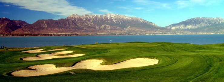 Panoramic view of a lush green golf course at TalonsCove Golf Club. Smooth