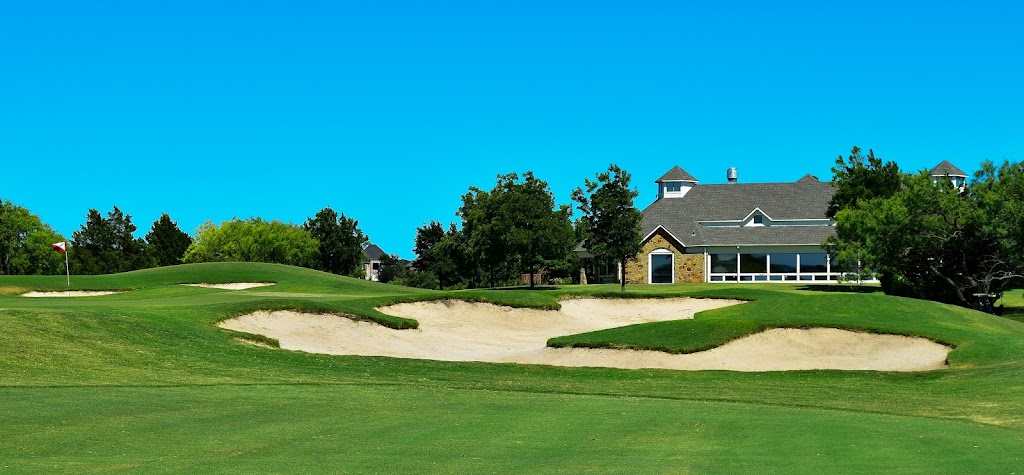 Panoramic view of a lush green golf course at Tangle Ridge Golf Course. Smooth