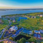 Panoramic view of a lush green golf course at Terra Ceia Bay Country Club. Smooth