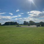 Panoramic view of a lush green golf course at Terre Du Lac Golf Course and Country Club. Smooth