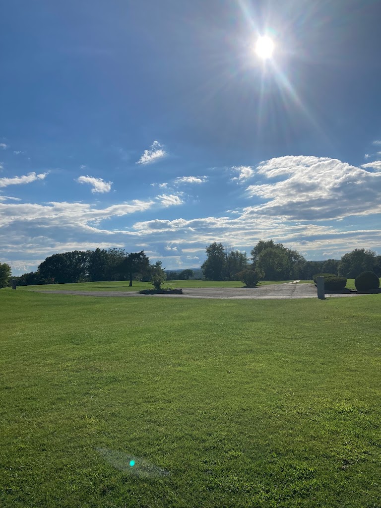 Panoramic view of a lush green golf course at Terre Du Lac Golf Course and Country Club. Smooth