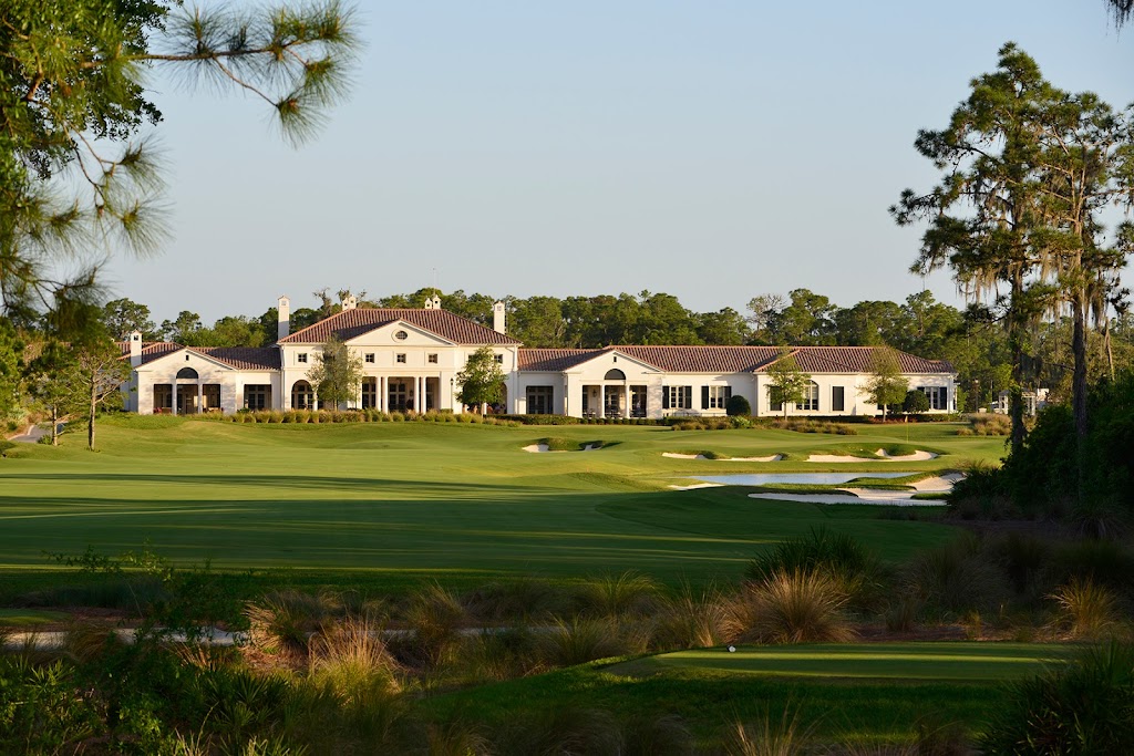 Panoramic view of a lush green golf course at The Concession Golf Club. Smooth