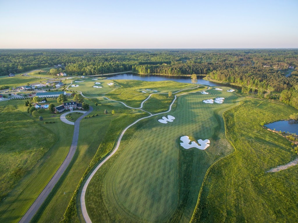 Panoramic view of a lush green golf course at The Federal Club Golf Course. Smooth