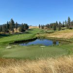 Panoramic view of a lush green golf course at The Golf Club At Black Rock. Smooth