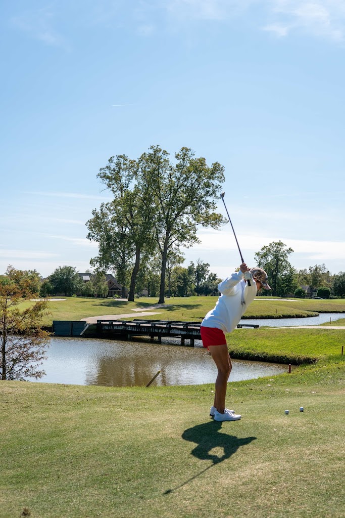 Panoramic view of a lush green golf course at The Golf Club at StoneBridge. Smooth