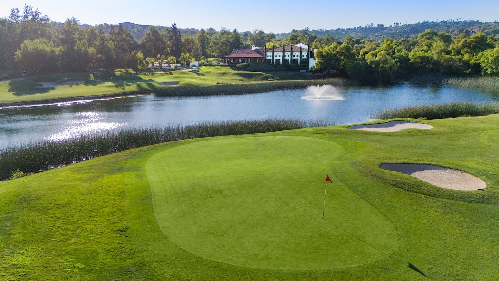 Panoramic view of a lush green golf course at The Golf Club of California. Smooth