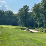 Panoramic view of a lush green golf course at The Golf Course at Glen Mills. Smooth