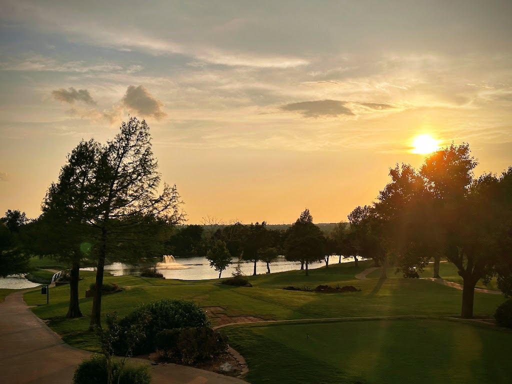 Panoramic view of a lush green golf course at The Greens Country Club. Smooth