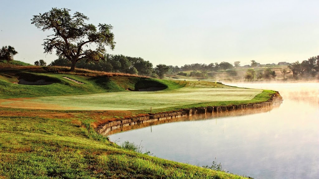 Panoramic view of a lush green golf course at The Harvester Club. Smooth