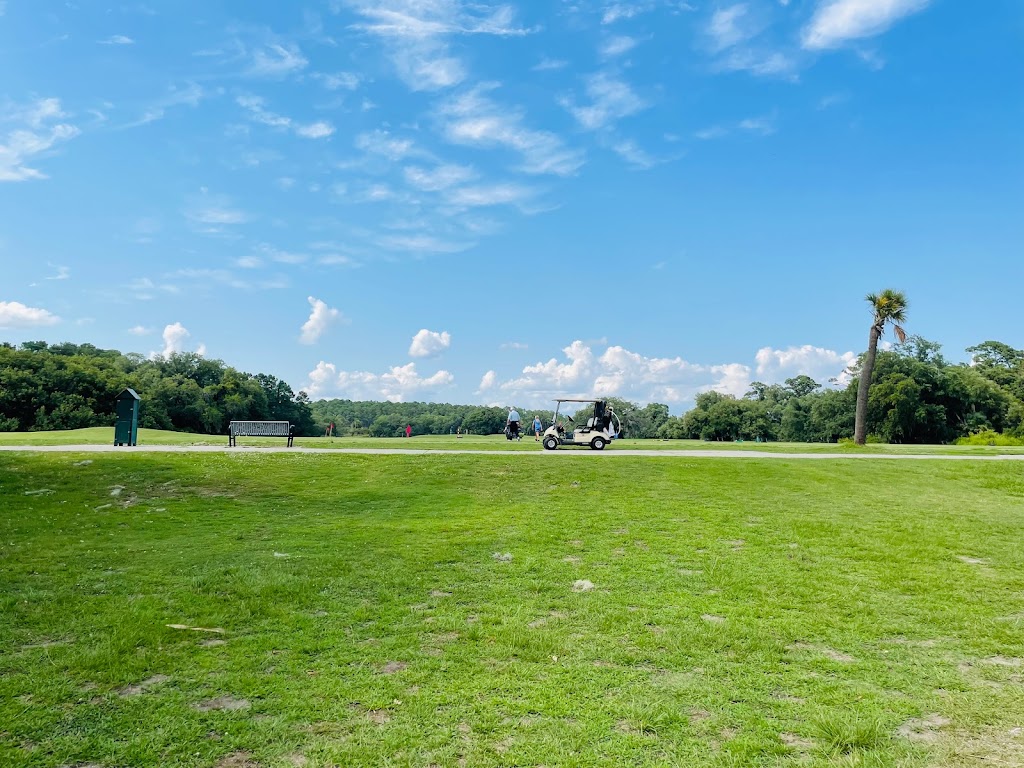 Panoramic view of a lush green golf course at The Legends at Parris Island Golf Course. Smooth