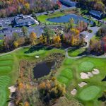 Panoramic view of a lush green golf course at The Links at LaBelle Winery. Smooth