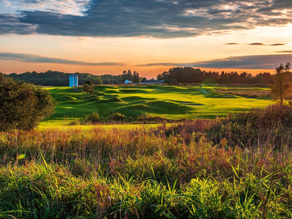 Panoramic view of a lush green golf course at The Links at Union Vale. Smooth